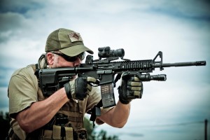 Shooter with Mission First Tactical gear on rifle