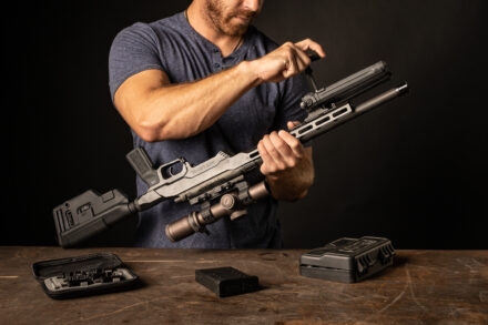 person holding a 16" Faxon Tactical Rifle