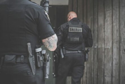 Law enforcement carrying firearms with polymer ammo.