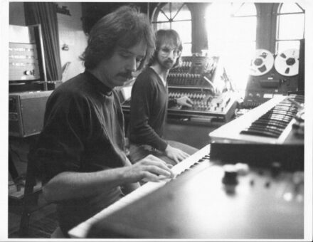 John Carpenter and Alan Howath working on music for a film.